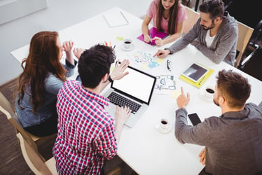 coworkers at a conference table