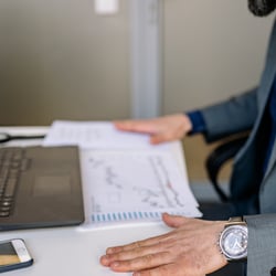 man stills at desk not working
