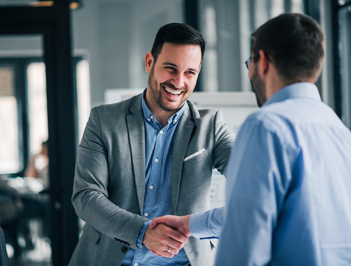 Two business men shaking hands. 