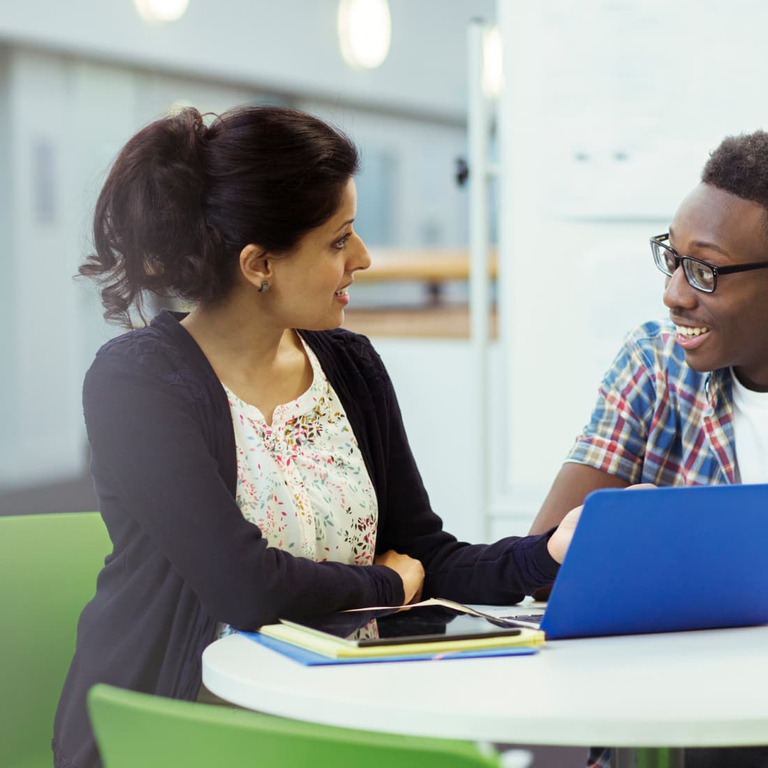 Woman conducting interview with potential employee. 