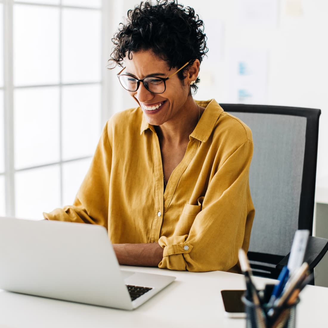 Small business woman working on payroll. 